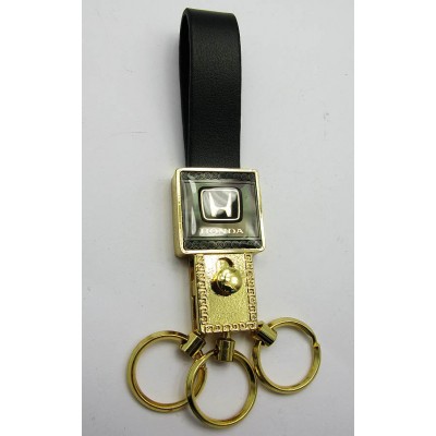 Брелок-авто с кожаным ремешком Honda золото (19332 F) Брелок-авто с кожаным ремешком Honda золото (19332 F)