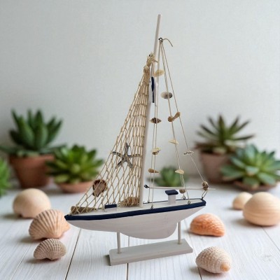 Модель парусника с ракушками на подставке ( 53 x 34 x 5.5 см ) Модель парусника с ракушками на подставке ( 53 x 34 x 5.5 см )