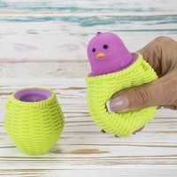 Игрушка антистресс Фуфлик Цыпленок сиреневый в зеленой корзинке