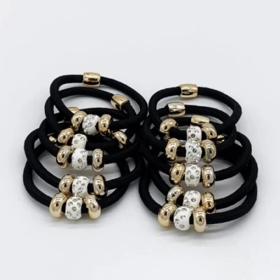 Резинка жгутик шамбала в стразах с золотыми кружками