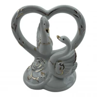 Лебеди с сердцем фарфор (11х11х7 см)