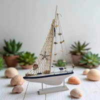 Модель парусника с ракушками на подставке ( 53 x 34 x 5.5 см )