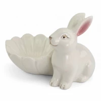 Подставка для украшений «Кролик с цветком» фарфоровая (8х11х8,5 см) Подставка для украшений «Кролик с цветком» фарфоровая (8х11х8,5 см)