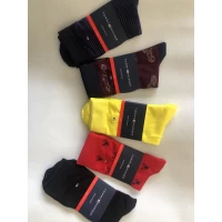 Носки TOMMY HILFIGER ликра хлопок мужские 40-45 высокие в рисунок . Цвет : ассорти . Производство Турция