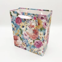 Пакет цветы с атласной ручкой с напылением из серебра, 18*21*8,5 см, цвета в ассортименте Пакет цветы с атласной ручкой с напылением из серебра, 18*21*8,5 см, цвета в ассортименте