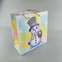 Пакеты бумажные подарочные , новогодние Квадрат 23*24*10- 01 (12 шт) Пакеты бумажные подарочные , новогодние Квадрат 23*24*10- 01 (12 шт)