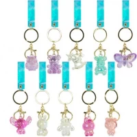 Брелок з фігуркою та голографічною підвіскою-стрічкою 372