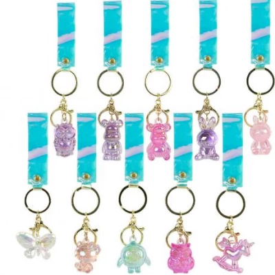 Брелок з фігуркою та голографічною підвіскою-стрічкою 371