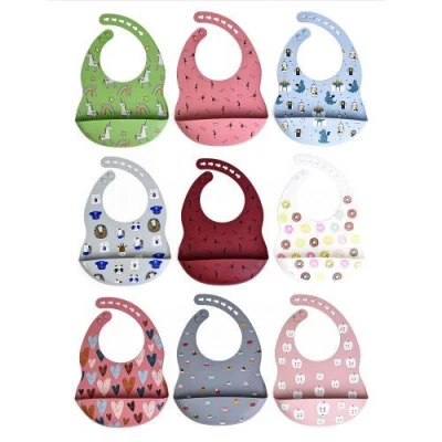 Слюнявчик силиконовый с карманом с рисунком 29*21см