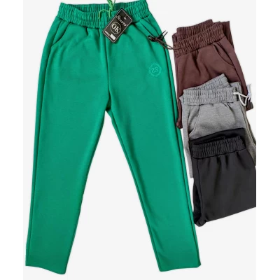 Брюки жіночі спортивні, демісезонні. Золото. Тканина трикотажна плотна. Розміри: 4XL, 5XL, 6XL.