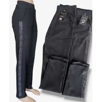 Брючки жіночі демісезонні. Золото.  Стрази є чорні , або сріблясті. Норма. Розміри: 5XL, 6XL, 7XL.