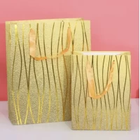 Пакет гигант вертикальный "Линии на золотом" 30х42 см Пакет гигант вертикальный "Линии на золотом" 30х42 см