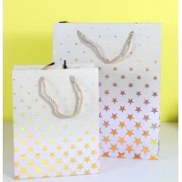 Пакет для подарка большой вертикальный "Звёзды омбре бежевый" 26х32 см
