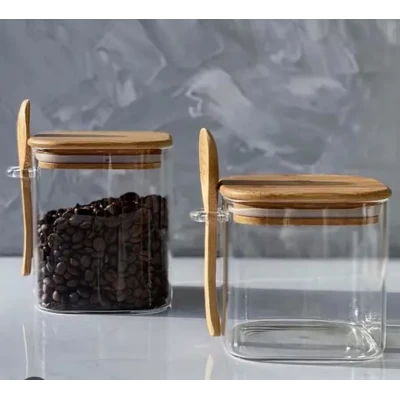 Стеклянная ёмкость с бамбуковой крышкой и ложкой (600мл) Стеклянная ёмкость с бамбуковой крышкой и ложкой (600мл)