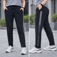 Брюки жіночі спортивні, весна-осінь. Фірми Kenalin. Тканина мікродайвінг, лампаси з сріблястих страз. Розміри: 2XL-6XL. ( 48-56).