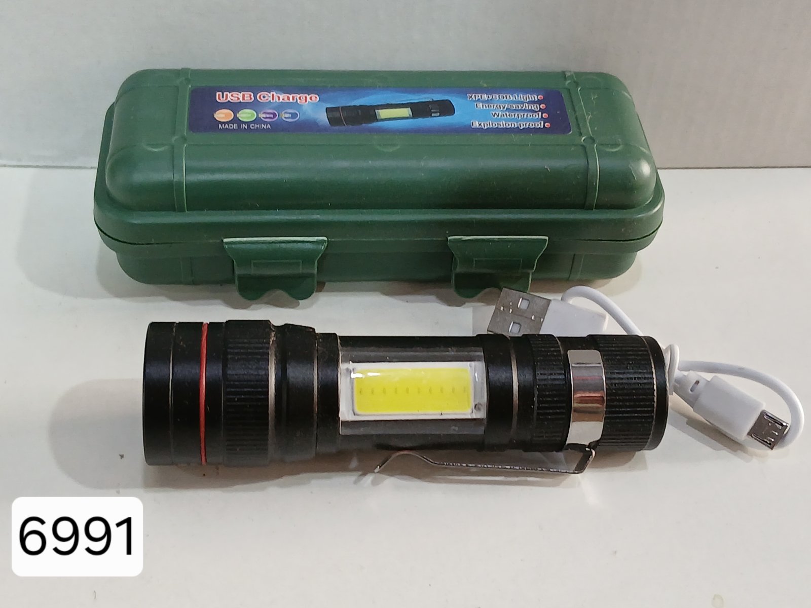 Фонарь ручной 6991 (аккумуляторный, заряд USB, с боковым светом) Фонарь ручной 6991 (аккумуляторный, заряд USB, с боковым светом)