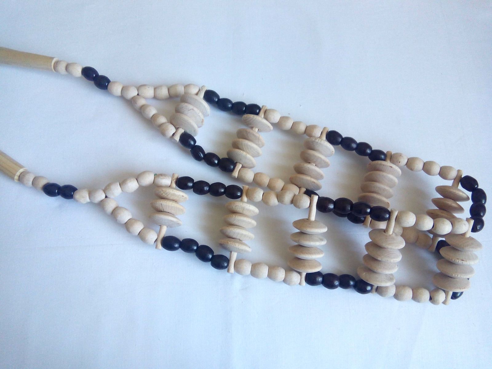 Ленточный деревянный массажер для спины Ленточный деревянный массажер для спины